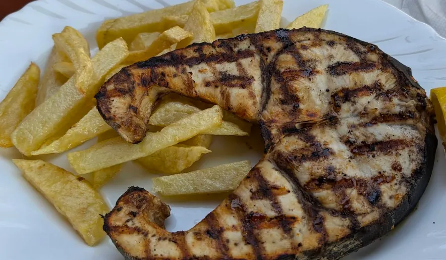 Grilled swordfish with fries